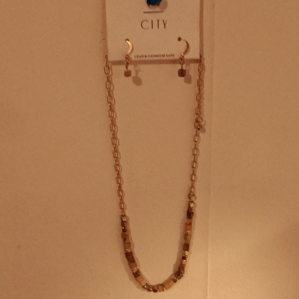 City matching earrings and necklace